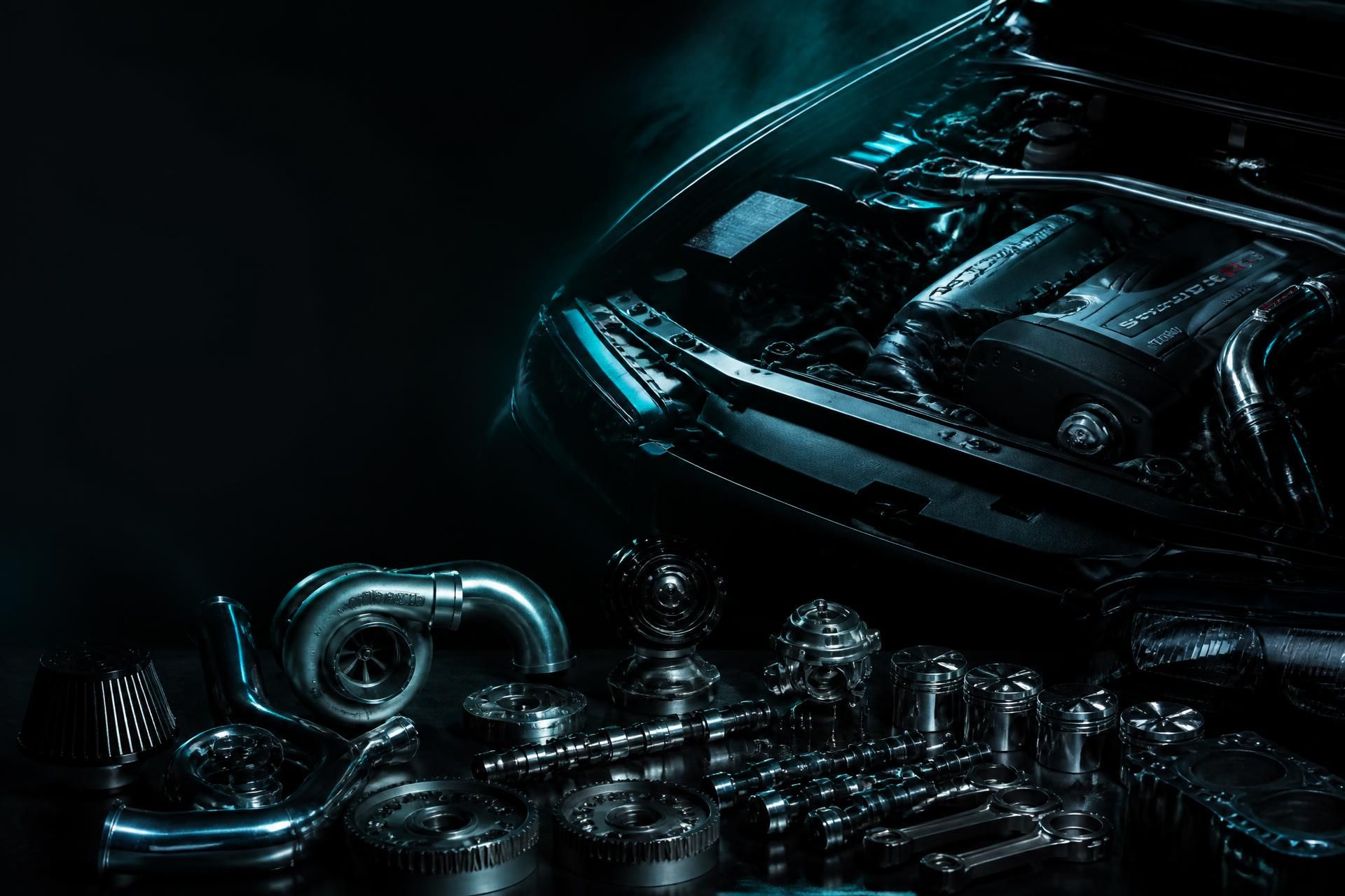 Precision Japanese engine and auto parts under dramatic teal lighting